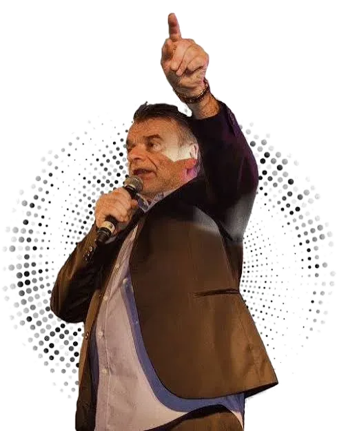 Sid Hudson with a microphone, pointing to the crowd at a Cali-R soul night